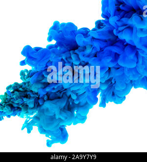Cloud of blue ink in water isolated on white background. Stock Photo