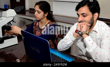 Students working in lab Stock Photo