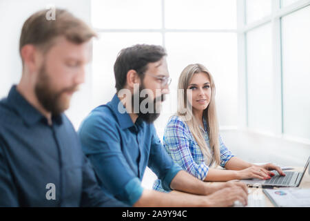 employees work together in a modern office Stock Photo