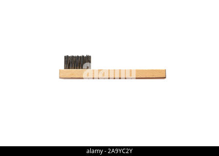 Short, wire brush with a wooden handle, isolated on a white background with a clipping path. Stock Photo