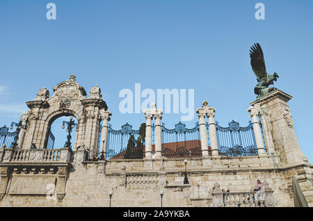 Budapest, Hungary - Nov 6, 2019: Statue of the mythological bird Turul and historical staircase in the courtyard of Buda Castle. The Hungarian national symbol and cultural heritage. Stock Photo