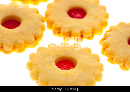 christmas cookies: several round Christmas cookies (Spitzbube) with strawberry jam Stock Photo