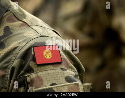 Flag of Kyrgyzstan on military uniform. Army, armed forces, soldiers. Collage. Stock Photo