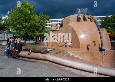 Breitscheidplaatz and Fountain in square beside Europa Center in Charlottenurg Berlin Germany. The Europa-Center is a building complex on Breitscheidp Stock Photo