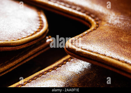 Detail of an old leather bag briefcase close up Stock Photo