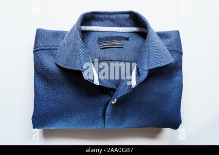 Blue Man Shirt on White Background. Clothes background Stock Photo