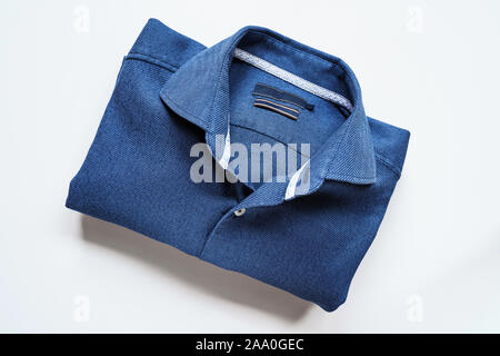 Blue Man Shirt on White Background. Clothes background Stock Photo