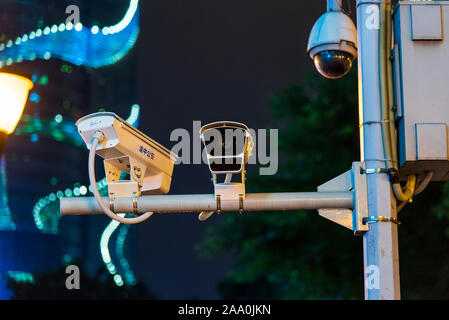 Chongqing, China - July 22, 2019: Surveillance CCTV camera on the street a common view in Chongqing, the city with the largest number of cameras in Ch Stock Photo
