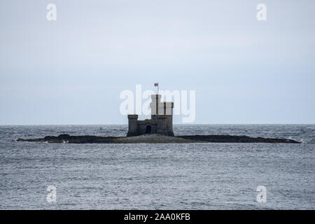 St Mary's Isle also known as Conister Rock or the Tower of Refuge is a partially submerged reef in Douglas Bay on the Isle of Man Stock Photo