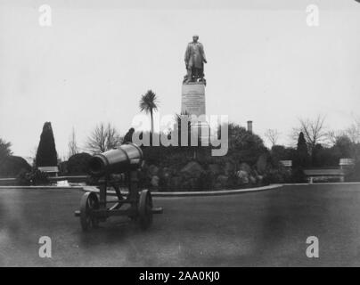 Black and white photograph of a cannon and a statue of the British Royal Navy officer and explorer of the Arctic, Rear Admiral Sir John Franklin in Franklin Square in Hobart, Tasmania, Australia, by photographer Frank Coxhead, 1885. From the New York Public Library. () Stock Photo