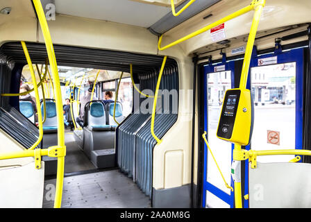 Moscow, Russia - July 7, 2019: Interior of modern city bus with automatic validator for reading and scanning ticket, cards and bank cards. Selective f Stock Photo