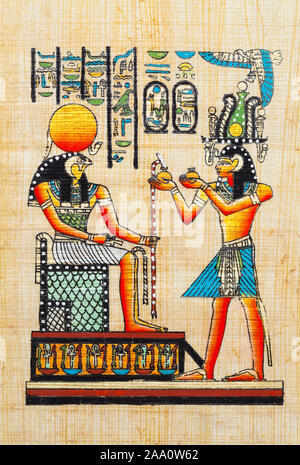 Egyptian Papyrus with Painting of Pharoah and Osiris. Stock Photo
