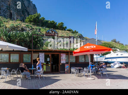 The Eolo Cafe bar restaurant near the boat marina/harbour in Cefalú, Sicily. Stock Photo