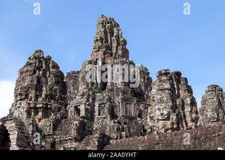 Bayon Temple, Siem Reap, Cambodia. This temple is famous for its variety of different Buddah faces. They are in pristine condition and rank among the Stock Photo