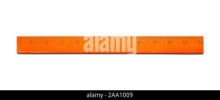 Twelve Inch Orange Wood Ruler Isolated on White Background. Stock Photo