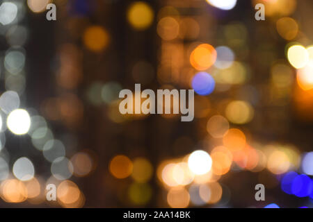 Abstract blurred bokeh background with glittering night city lights Stock Photo