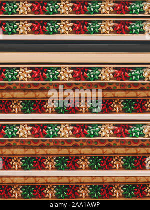 Abstract background with ribbons Photo pattern with multicolored paper bows and ribbons on shelves Stock Photo