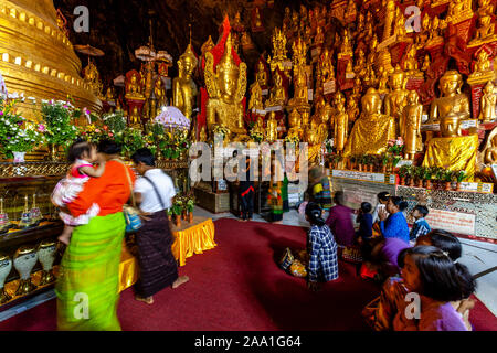 People Praying At The Pindaya Caves (Shwe Oo Min Pagoda) Pindaya, Shan State, Myanmar. Stock Photo