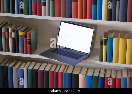Computer and books from above Stock Photo