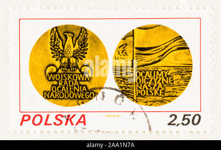 SEATTLE WASHINGTON - October 9, 2019: Stamp of Poland commemorating the first year of  Military Council of National Salvation rule, issued in 1982. Stock Photo