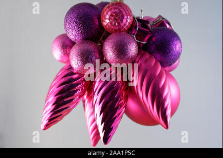 Purple, pink and red Christmas tree decorations Stock Photo