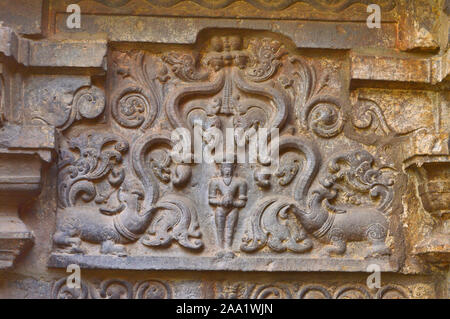 Carved sculpture on the wall of Kopeshwar Temple, Khidrapur, Maharashtra, India Stock Photo