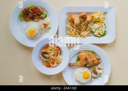 Flat lay view of various dishes of Asian Chinese Western food. Top down view. Stock Photo