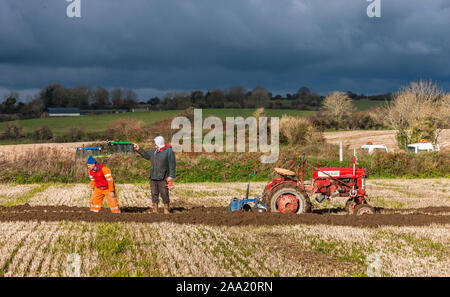 Twopothouse, Cork, Ireland. 17th  November, 2019. Trevor and Mossey Fleming,Castlemartyr checking their drills at the Twopothouse  ploughing associati Stock Photo