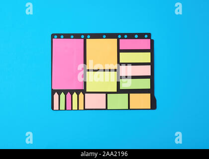 various blank paper multicolored stickers on a black background, close up Stock Photo