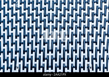 Plastic fabrics background. Fiber material. Extreme macro. Background black plastic weave. Stock Photo