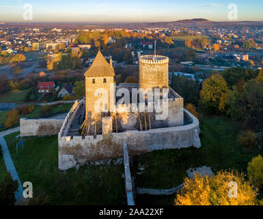 Medieval gothic castle in Bedzin, Upper Silesia, Poland. Aerial view in fall in sunrise light Stock Photo