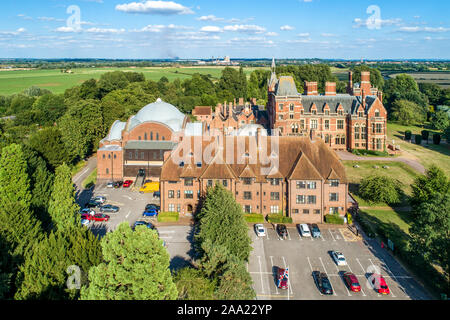 Kelham Hall - the  masterpiece of Victorian Gothic style near Newark-on-Trent with a hotel, conference center, spa, park and camping. Aerial view Stock Photo