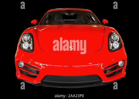 Sydney, Australia - Jannuary 7, 2015: Front view of a Red Porsche Cayman Car on black background. ILLUSTRATIVE EDITORIAL. Stock Photo