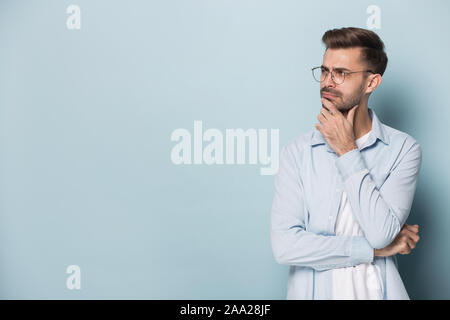 Close up portrait with pensive handsome bearded man. Stock Photo
