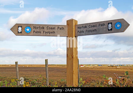 A Norfolk Coast Path fingerpost sign by the harbour on the North Norfolk coast at Blakeney, Norfolk, England, United Kingdom, Europe. Stock Photo