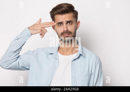 Close up portrait with nervous handsome bearded man. Stock Photo