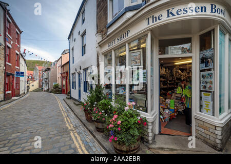 The High Street in the traditional fishing village of Staithes, North York Moors National Park, North Yorkshire, England, UK