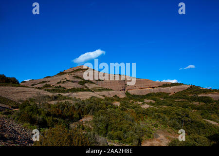 The 1056 metre high mountain of Montcau, in the Parc Natural Sant Llorenc del Munt massif, near Barcelona, Catalonia. Stock Photo