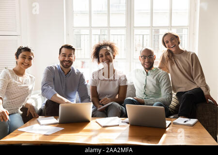 Portrait of happy mixed race young female male friends. Stock Photo