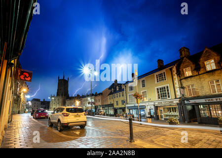 Late night thunder and lightning storm over the marketplace in Cirencester, the heart of the Cotswolds Stock Photo