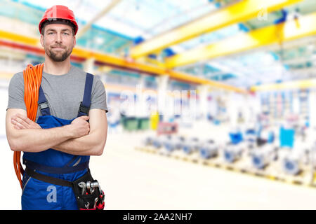 workers with equipment in a factory - closeup Stock Photo