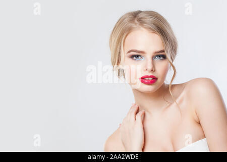 Woman face on white banner background. Red lips, blonde updo hairdo Stock Photo