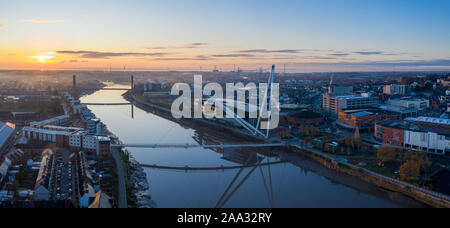 An aerial view at sunrise of Newport city centre, south wales United Kingdom, taken from the River Usk Stock Photo