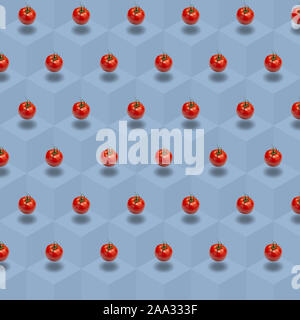 Tomato vegetable background, Isometric pattern photographed, Tomato's on a light blue background, wrapping paper, postcard, wallpaper, Minimal food co Stock Photo