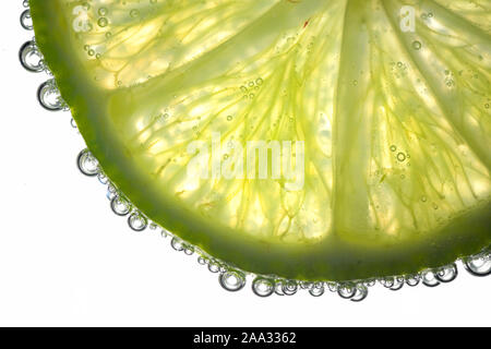 Lemon Slices In Water With Air Bubbles Stock Photo
