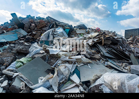 bricks stones mortar, paper, construction garbage close up Stock Photo