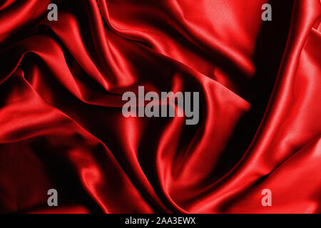 Red silk close up texture background. Stock Photo