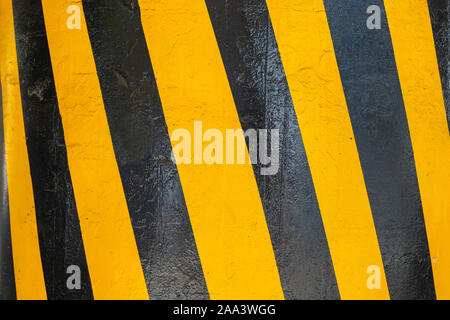 Yellow and black stripes diagonally. Warning lines in black and yellow. Striped rectangle. Warning to be careful - the potential danger Stock Photo