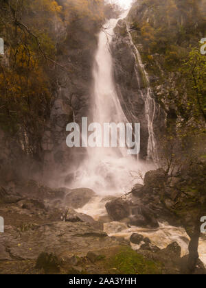 Aber Falls Waterfall in full flood after days of heavy rain Coedydd Aber National Nature Reserve Abergwyngregn Gwynedd North Wales UK, Stock Photo