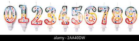 Birthday candles in the form of figures (numbers, dates) for cake isolated on white Stock Photo